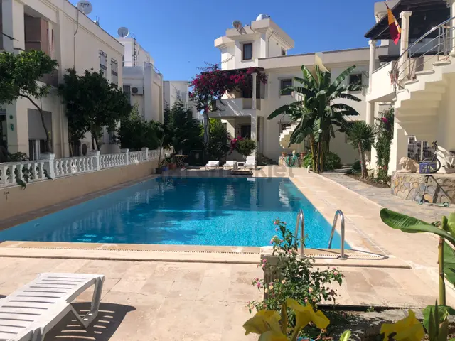 Bodrum Turgutreis Merkezde Satılık 2+1 Bahçe Katı Daire