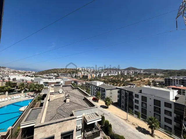 Kuşadası Değirmendere Mevkiinde Konforlu Elit Sitede Havuzlu 2+1 3