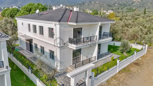 Mahmut İşler'den Güre'de Satılık Bahçeli 1+1 Sıfır Daire 2