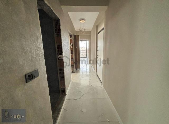 Kerim'den Küçükkuyu Merkez'de Deniz Manzaralı 2+1 Satılık Daire 5