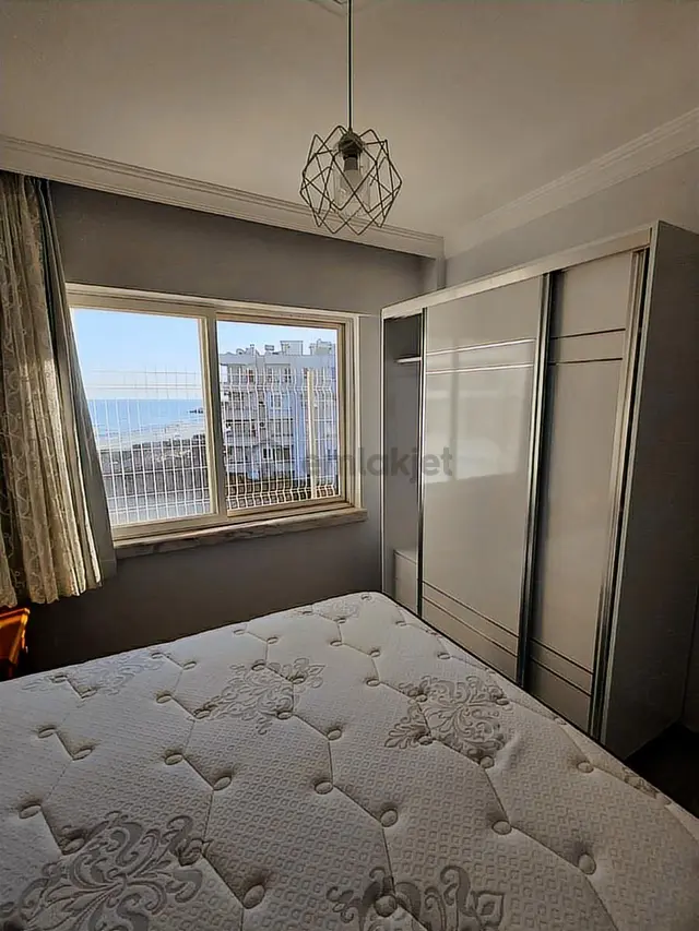 Uğur Emlak'tan Limonlu'da Satılık Denize Sıfır Eşyalı Daire 5
