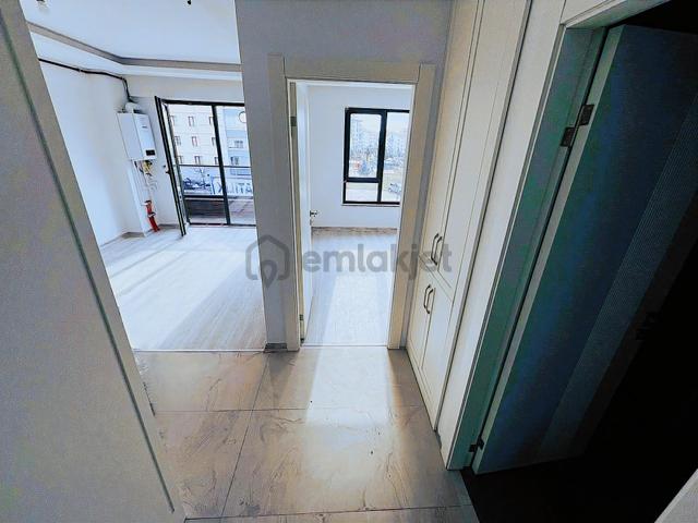 Batıkent'te Yerden Isıtmalı K.otoparklı 1+1 Satılık Daire 4
