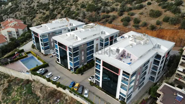 Kuşadası Ege'de Deniz Manzaralı, Havuzlu Sitede 200 M² 4+1 Satılık Lüks Daire 4
