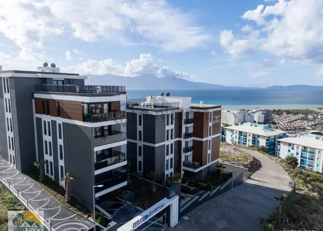 Kuşadası Değirmendere'de Full Deniz Manzaralı Geniş Teraslı Satılık 3+1 Daire 1