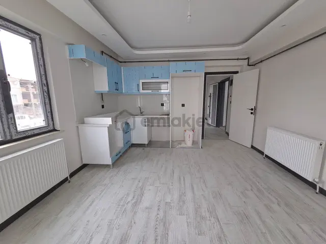 Cumhuriyet Mahallesinde Merkezi Konumda 2+0 Satılık Daire 5