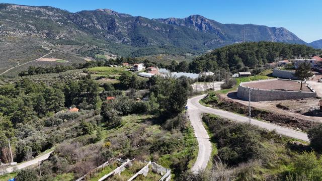 Olympos Yazır'da Deniz Manzaralı Asfalta Cephe Arazi 5