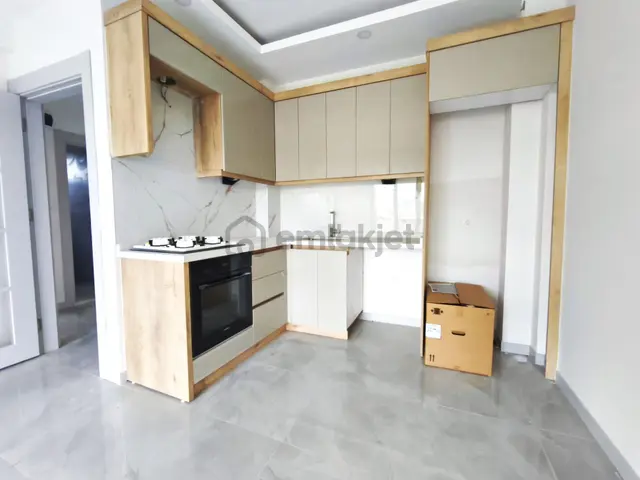 Aygül'den Burhaniye'de Sıfır Ön Cephe Yerden Isıtmalı Geniş Balkonlu Kaçmaz 1+1/2+1 Satılık Daireler 4