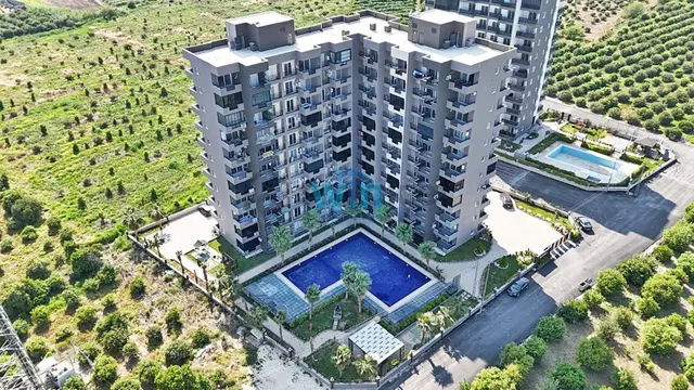Win'den Çeşmeli'de Sosyal Donatılı Satılık 1+1 Daire 1
