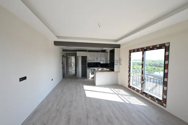 Üstünkent'ten Eski Mezitli'de Sıfır Yapıda Satılık 1+1 Daire 2