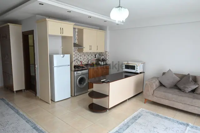Üstünkent'ten Çiftlikköy'de Full Eşyalı Ferah Oturumlu 1+1 Daire 3