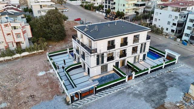 Didim Çamlık'ta Satılık Ayrı Mutfaklı 4+1 Havuzlu Tripleks 4