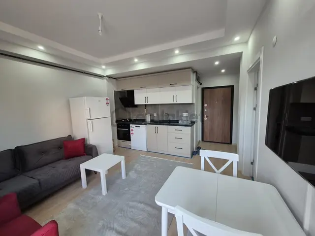 Kw Zena'dan Burhaniye Bahçelievlerde Kiralık Eşyalı 1+1 Daire 2