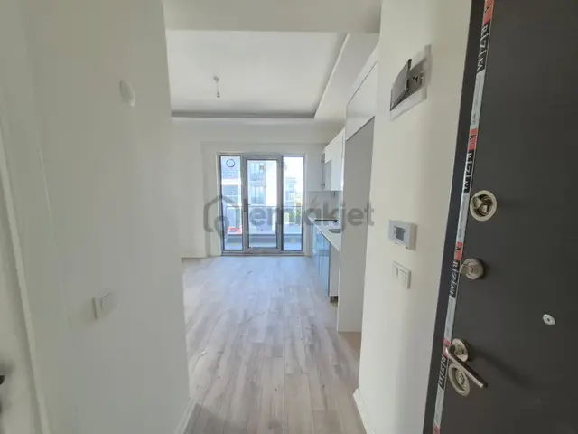 Delux'den Palm Suıts'te Cadde Cepheli Lux Satılık 1+1 Daire 2