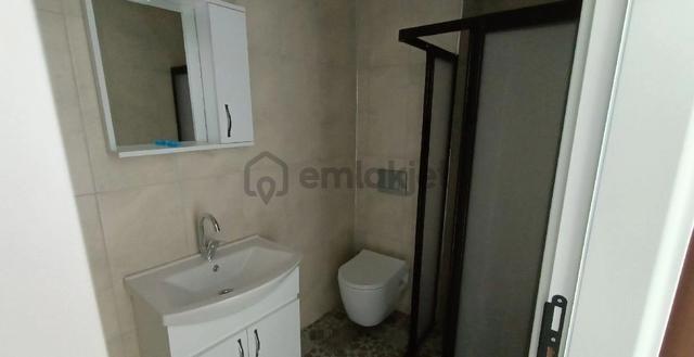 Atatürk Mahallesi Merkezî Konumda 1+1 Sıfır Kiralık Daire 4