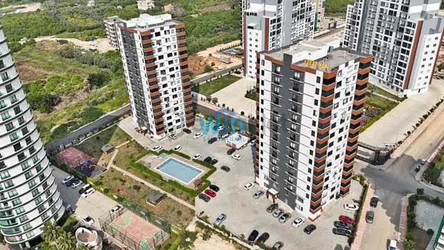 Win'den Akdeniz'de Kısmi Deniz Manzaralı Geniş Satılık 2+1 Daire 1