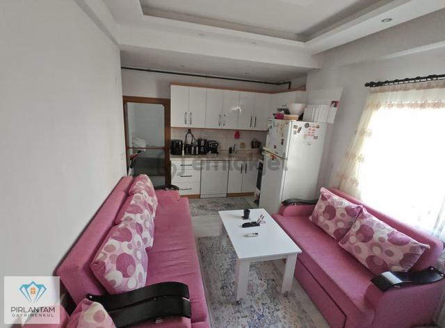 Bahçeli Evler Mahallesinde Kiracılı Satılık 1+1 Eşyalı Dai 2