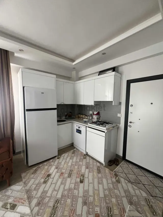 Kulepark~farkıyla~çok~geniş~40~m2net~oturumlu~1+1~eşyalı~satılık 3