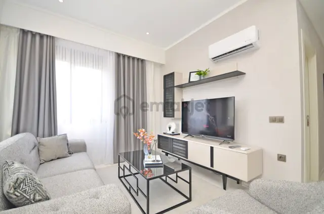 Alanya Mahmutlar'da Havuz Manzaralı Lüks Eşyalı 1+1 Satılık Daire 4