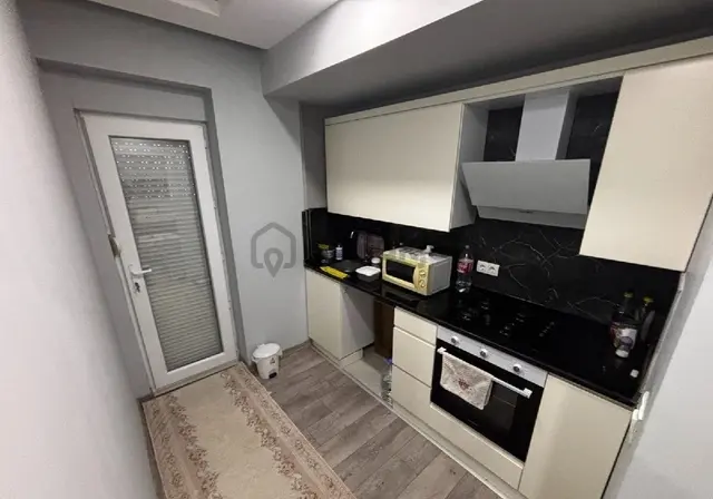Kızıltoprak Mahallesi'nde 1+1 Lüks Kapalı Otoparklı Eşyalı Satılık Daire 1