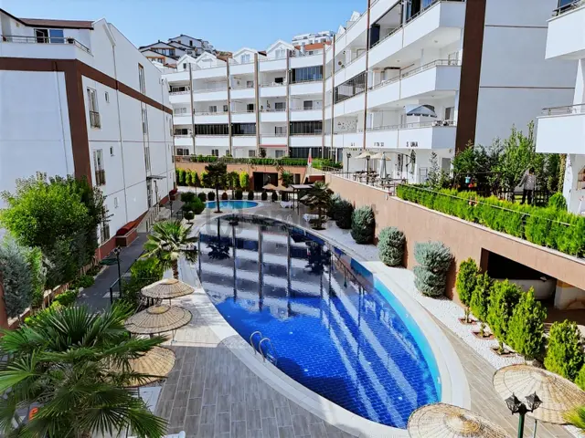 Emre Ünlü'den Havuzlu,otoparklı Sitede Kiralık 2+1 Ara Kat Daire 1