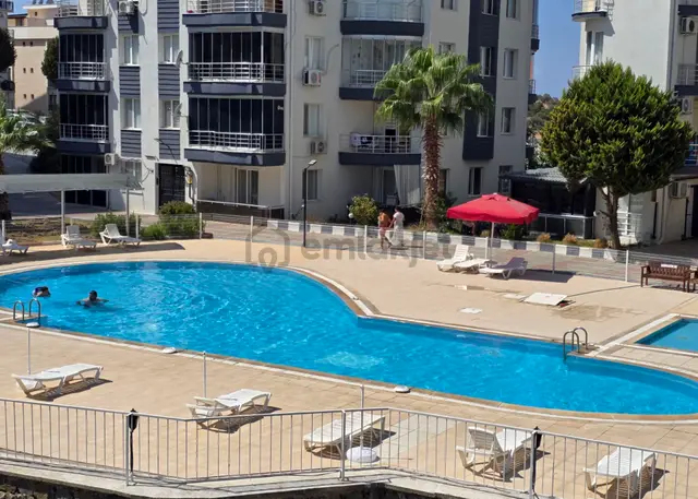 Kuşadası Merkezde Ahmet Cengiz 3 Sitesinde 3+1 135m2 Arakat Doğalgazlı Kapalı Mutfaklı Daire 1