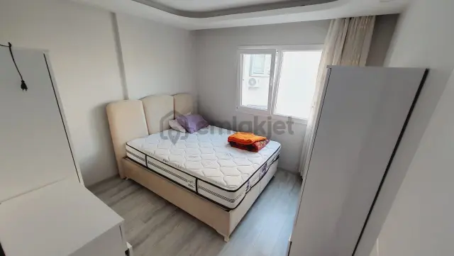 Kuşadası Davutlar'da Havuzlu Kapalı Otoparklı Kiralık 1+1 Daire 3