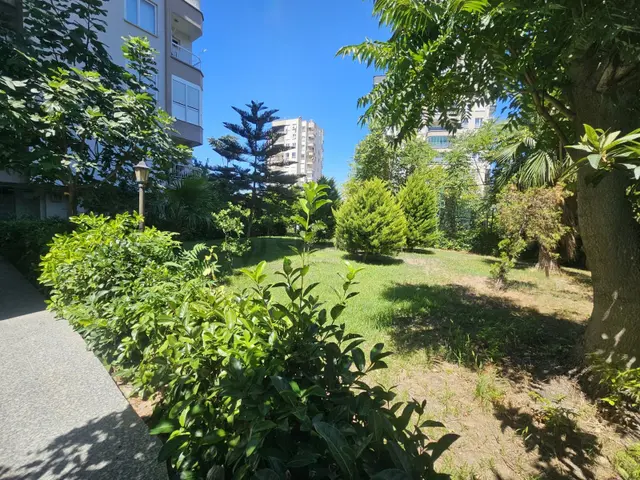 Güzeloba Dostlukkent Sitesi'nde Satılık Prestijli 1+1 Daire 3