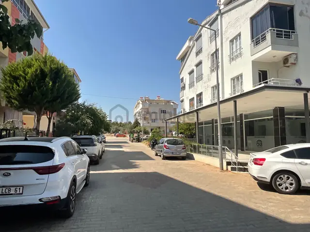 Didim Cumhuriyet Mahallesi'nde Satılık Masrafsız Ara Kat Çift Balkonlu 2+1 Ayrı Mutfak Daire 3