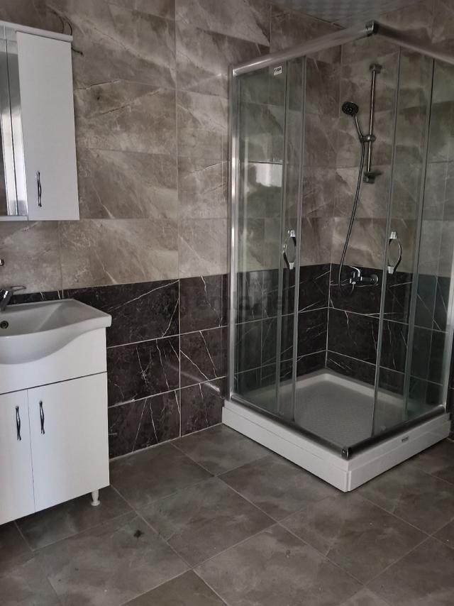 Koçyazı'da Kapalı Otoparklı Ayrı Mutfaklı Ebeveyn Banyolu Ara Kat 2+1 Kiralık 4