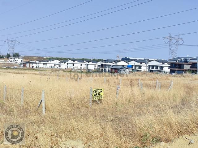 Deniz Manzaralı %50 İmarlı 12 Metre Cadde Cephe Satılık Arsa 1