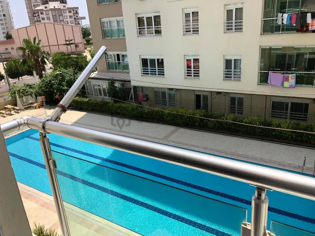 Sarısu'da 1+1 Havuzlu Güvenlikli Sitede Eşyalı Kiralık Daire 2
