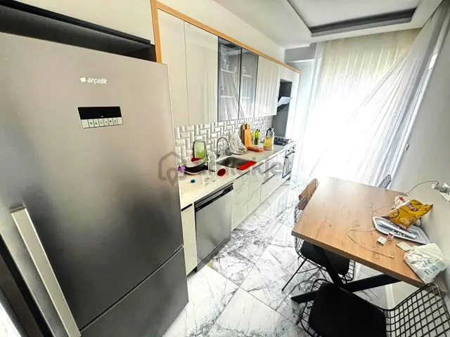 𝄞melodi'den Akçay'da Yüksek Kredili Ön Cephe Arakat Ayrı Mutfaklı Cam Balkonlu 2+1 Daire 1