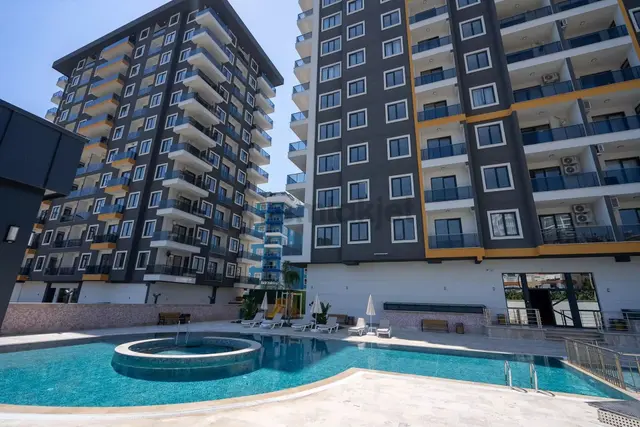 Alanya Mahmutlarda Havuz Manzaralı Lüks Kompleks 2+1 Satılık Daire 1