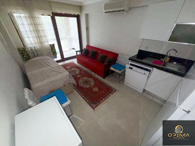 Opima Emlak'tan Ocaklar'da Havuzlu Sitede Eşyalı Kiralık 1+1 Daire 1