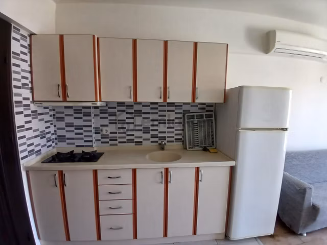 Ender Uysal Gayrimenkulden Asmalıevlerde Klimalı Balkonlu 1+1 Kiralık Apart. 1