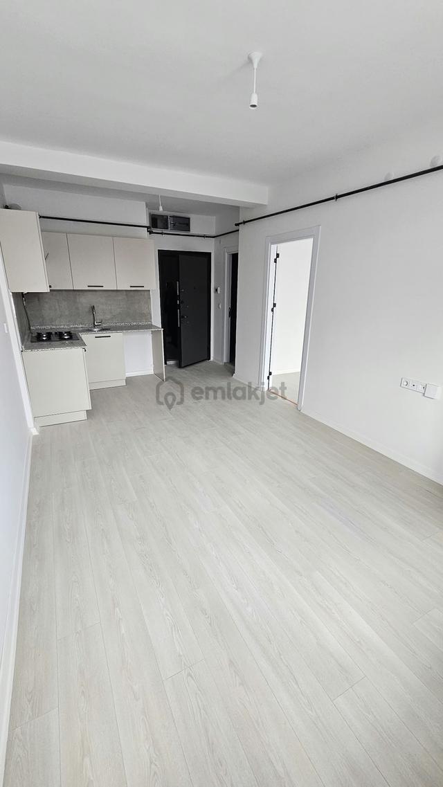 Akademi'den Amerikan Mutfaklı Yerden Isıtmalı Kiralık 1+1