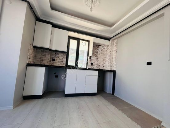 Atakum'da Merkezi Lokasyonda İskanlı Binada Sıfır 1+1