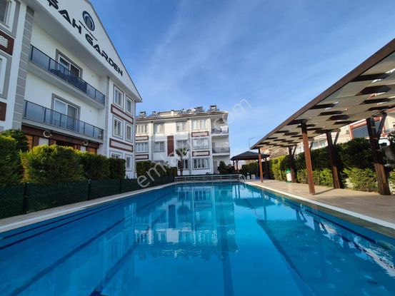 Çiğdem Emlak'tan Dalaman'da Havuzlu Eşyalı Satılık 2+1 Daire