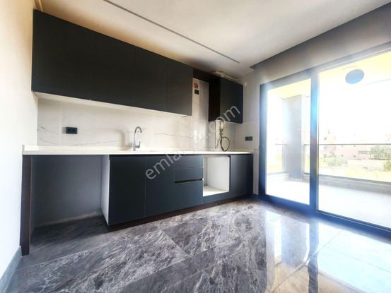 Burhaniye Ören'de Aygülden Sıfır Ön Cephe Ayrı Mutfak Geniş Balkonlu Doğalgazlı 2+1 Satılık Daireler