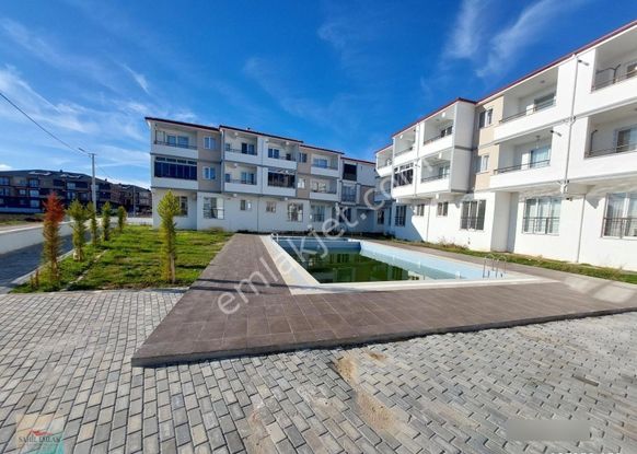 Kumbağ'da Satılık Sıfır 1 +1 Daire Havuzlu Sahil Emlak'tan