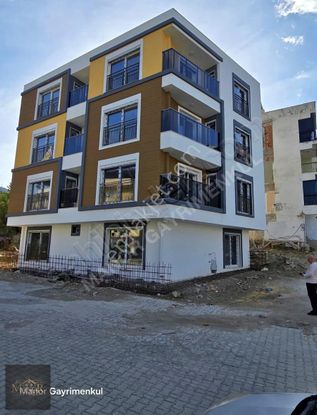 Kuşadası Davutlarda Yeni Binada 2+1 Bahçe Katı Daire