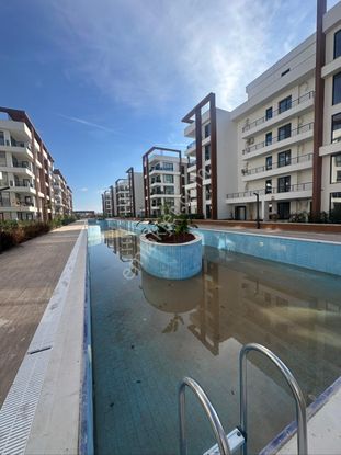 Siteiçinde Ayrı Mutfaklı Katta 2+1 Satılık Daire