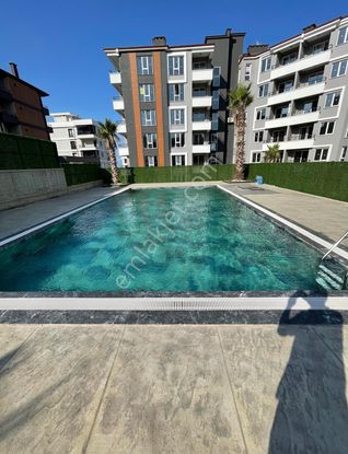 Atakumda Havuzlu Sitede Eşyalı 1+1 Satılık Daire + Cam Balkon + Kombi