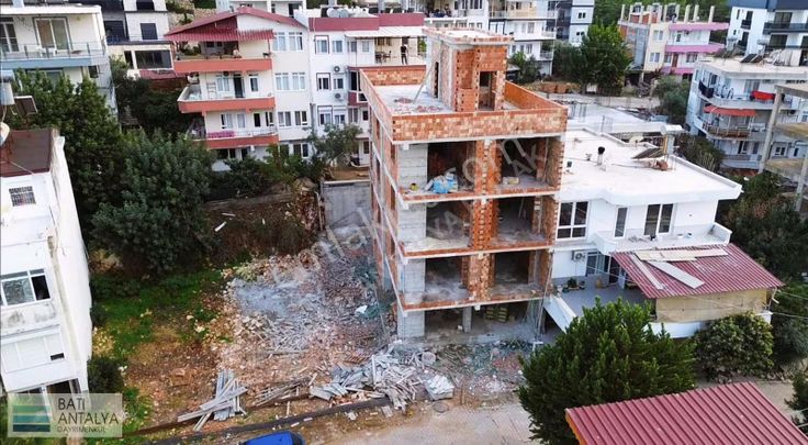 Deniz Manzaralı Kayalık Zeminde Satılık Lüks 1+1 Daire