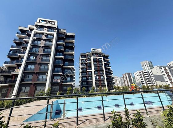 Tüzün'den Mezitli'de 1+1 Eşyalı Havuzlu Satılık Daire