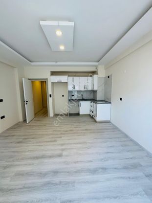 Kuşadası Davutlar'da 3+1 Merkezi Konumda Satılık Çatı Dubleks Daire