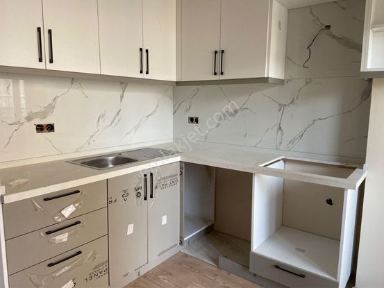 Davutlar'da Merkezi Konumda 2+1 Sıfır Satılık Daire