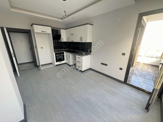 Akçay Aras Emlaktan Altınkumda Sıfır 1+1 Daire