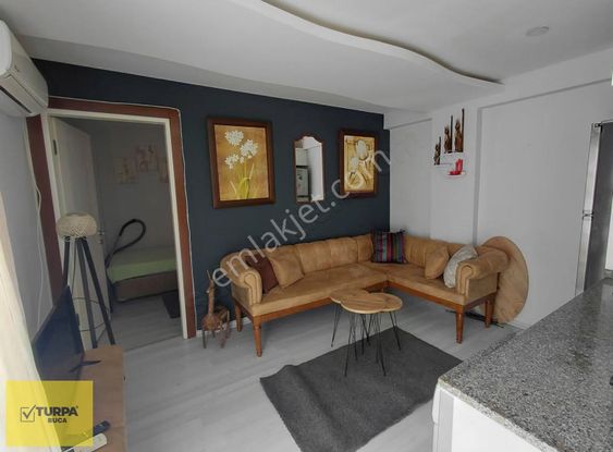 Turpa Buca'dan Kiralık 1+1 Bahçe Katı Eşyalı Klimalı Daire