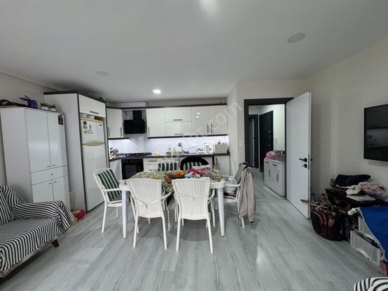 Güzelçamlı'da Satılık Geniş Teraslı 1+1 Merkezde Daire